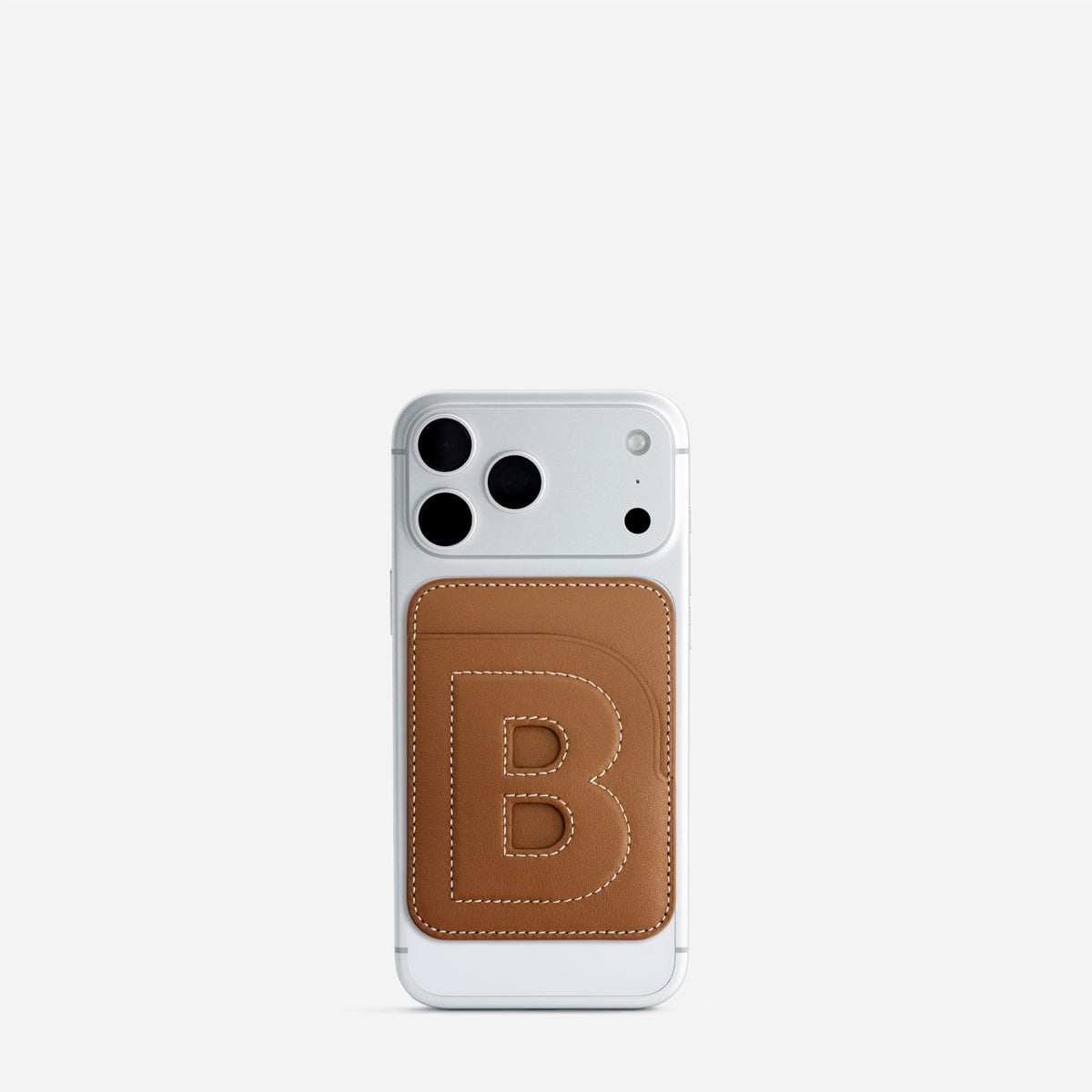 MagSafe cardholder in Canyon, initial B, on phone