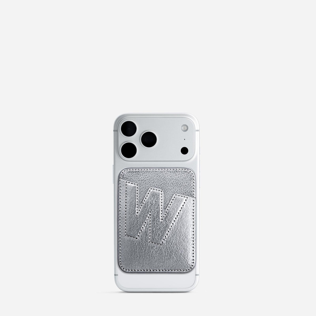 MagSafe cardholder in Metallic Silver, initial W, on phone