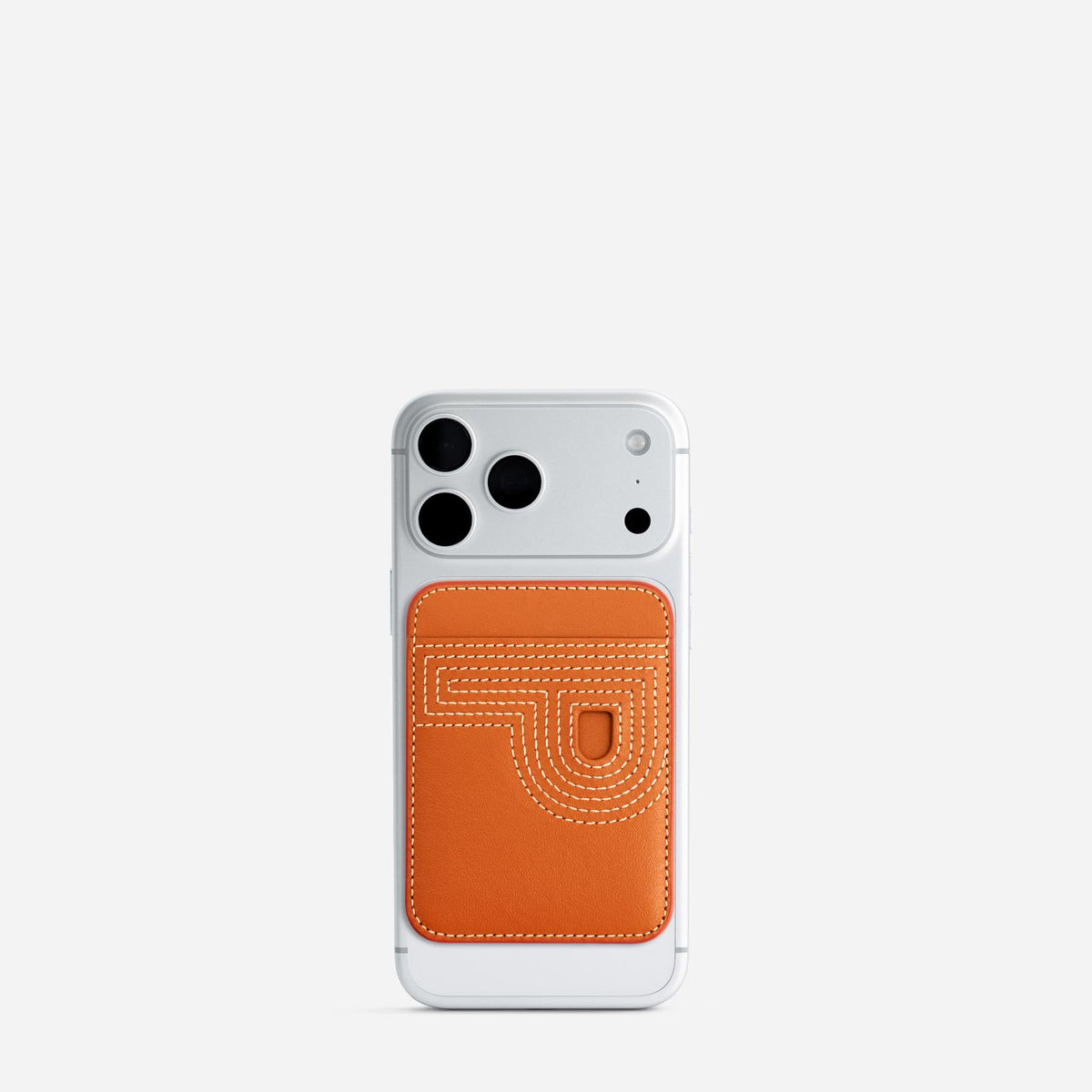 MagSafe cardholder in Orange, initial P, on phone