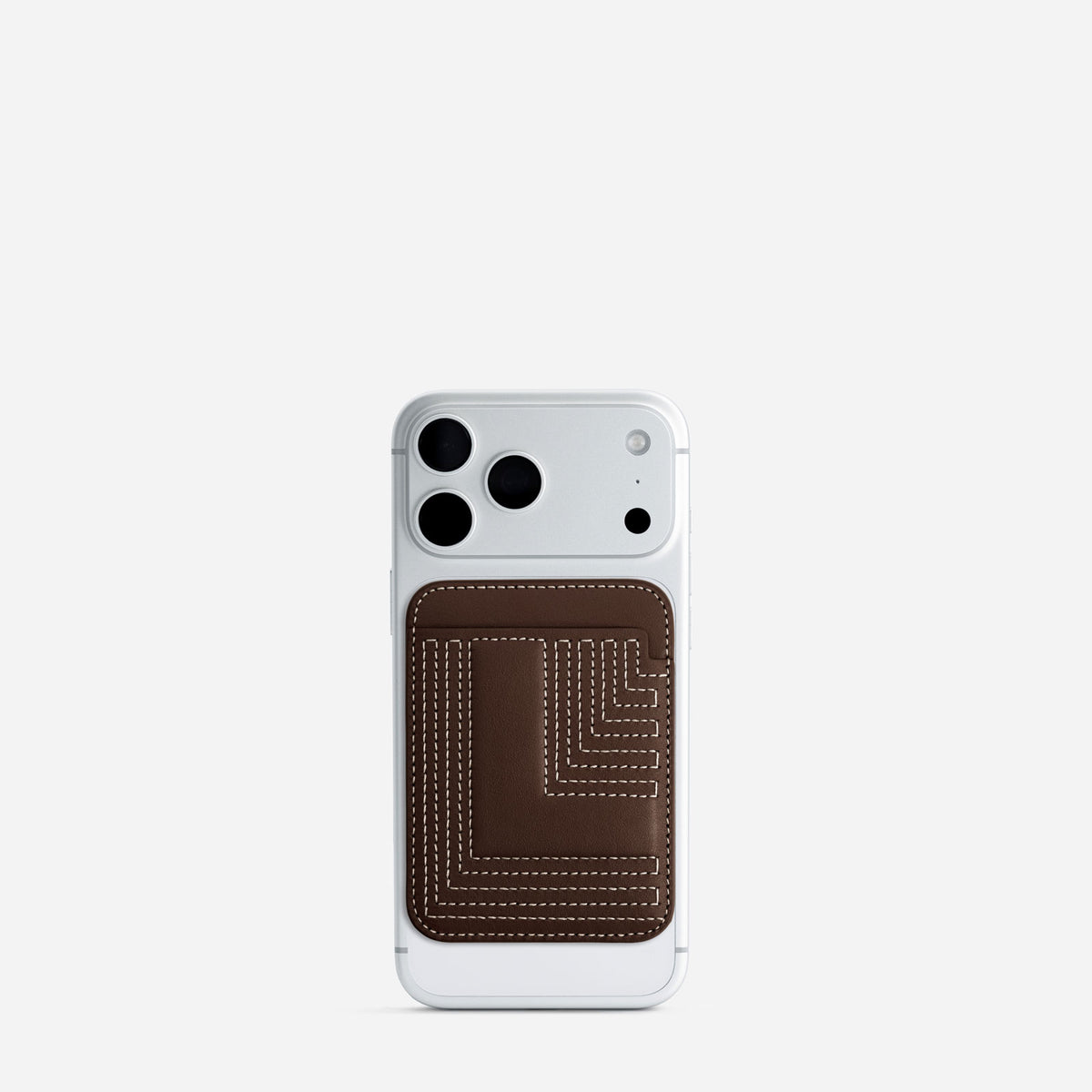 MagSafe cardholder in Espresso, initial L, on phone