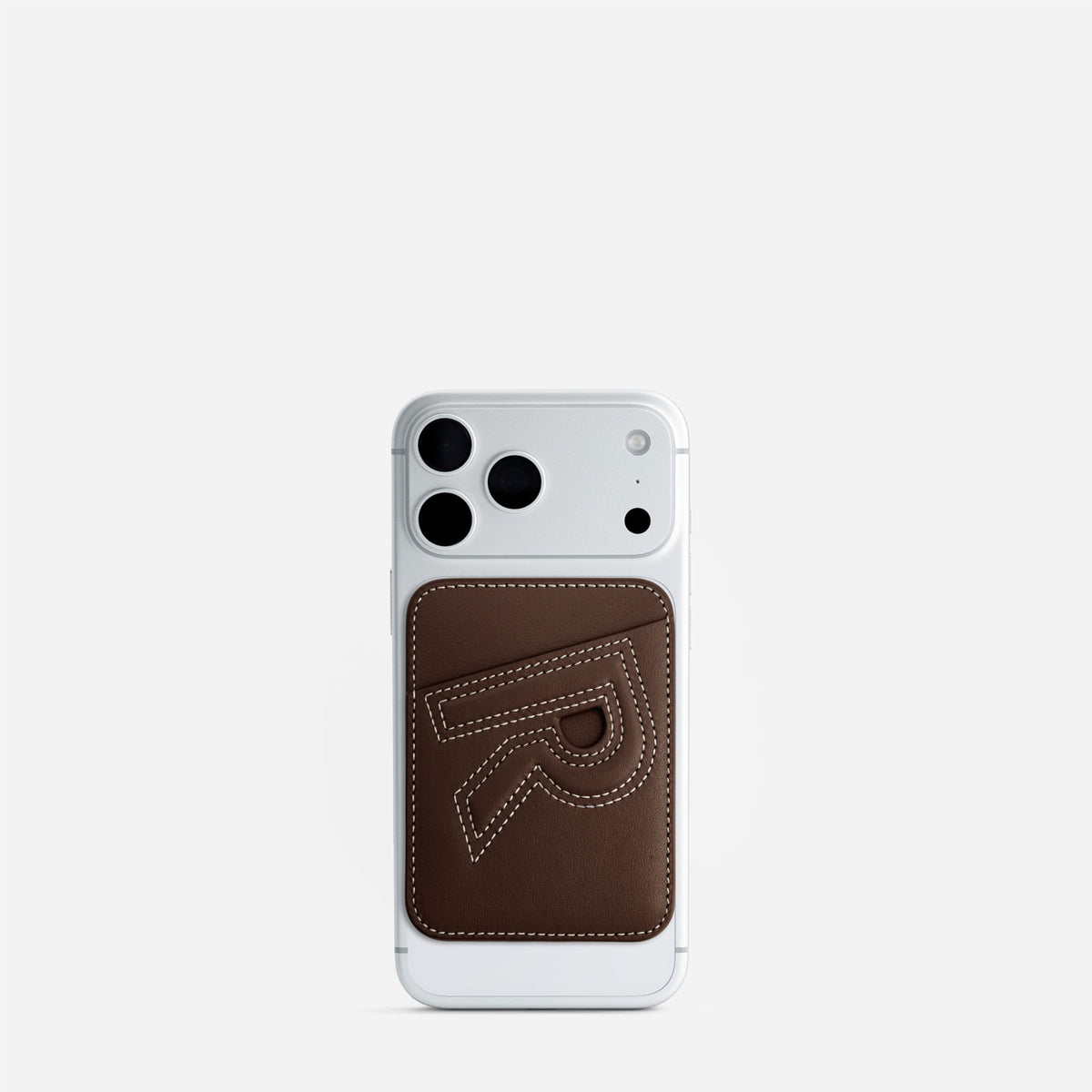 MagSafe cardholder in Espresso, initial R, on phone